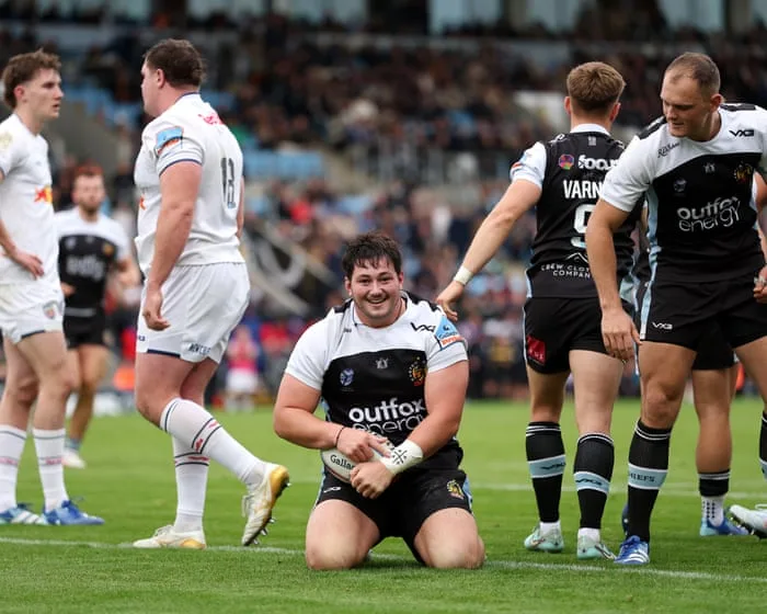 Exeter claims first league win despite Wade’s milestone hat-trick